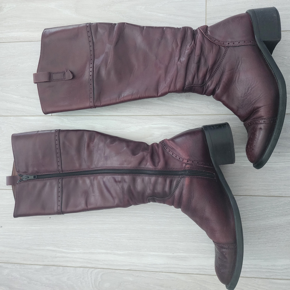 Brown Heeled Boots with Knee-High Design and Zipper Closure